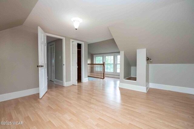 503 N Main St, Bluffton, OH 45817 - additional living space with light wood finished floors and lofted ceiling