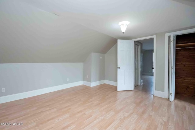 503 N Main St, Bluffton, OH 45817 - bonus room with light wood-style floors and vaulted ceiling