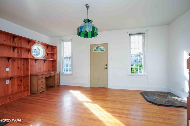 503 N Main St, Bluffton, OH 45817 - entrance foyer featuring light wood finished floors and baseboards