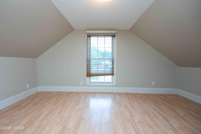 503 N Main St, Bluffton, OH 45817 - additional living space featuring wood finished floors and vaulted ceiling