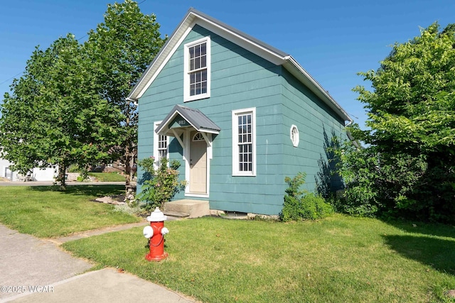 503 N Main St, Bluffton, OH 45817 - view of front facade featuring a front lawn