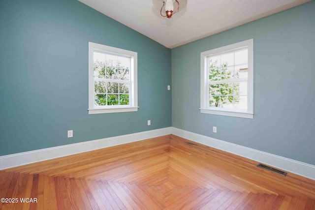 503 N Main St, Bluffton, OH 45817 - empty room with lofted ceiling and baseboards