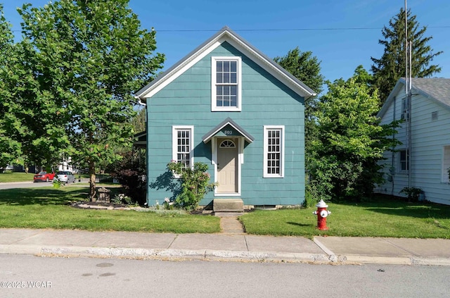 503 N Main St, Bluffton, OH 45817 - view of front facade with a front lawn