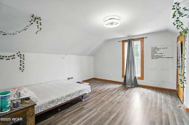 6250 Kreischer Rd, Van Wert, OH 45891 - bedroom with lofted ceiling and wood finished floors