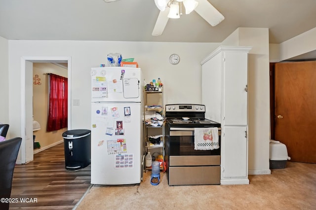 605 Hendricks Ave, Saint Marys, OH 45885 - kitchen featuring stainless steel range with electric stovetop, freestanding refrigerator, a ceiling fan, and baseboards
