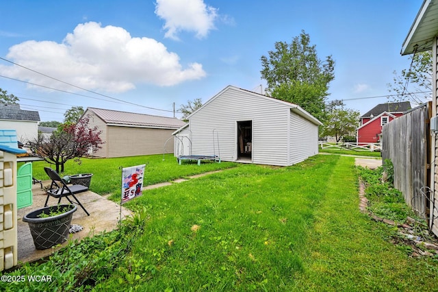 605 Hendricks Ave, Saint Marys, OH 45885 - view of yard with an outbuilding and a fire pit