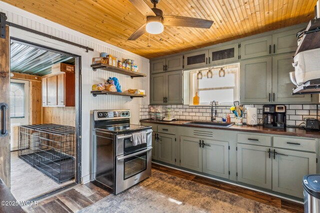 408 Vine St, Kenton, OH 43326 - kitchen featuring double oven range, wooden ceiling, green cabinets, tasteful backsplash, and ceiling fan