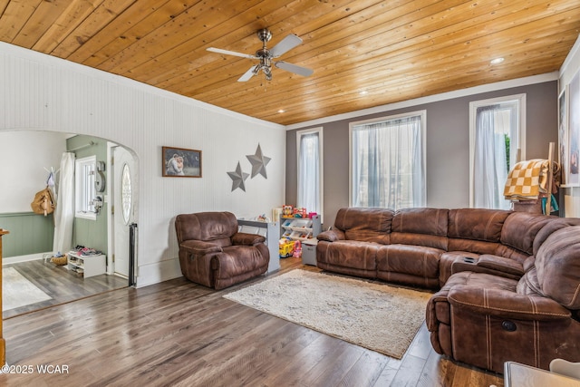 408 Vine St, Kenton, OH 43326 - living room with wooden ceiling, wood finished floors, arched walkways, ornamental molding, and a ceiling fan