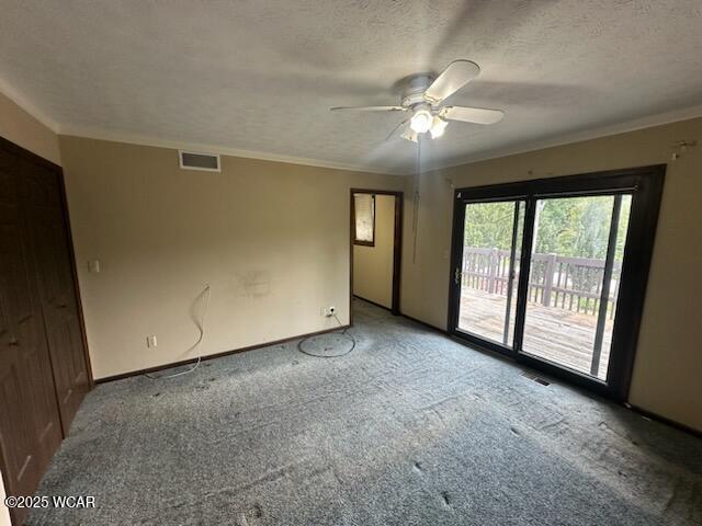 1317 Timberlane Dr, Lima, OH 45805 - carpeted empty room with a ceiling fan, crown molding, and a textured ceiling