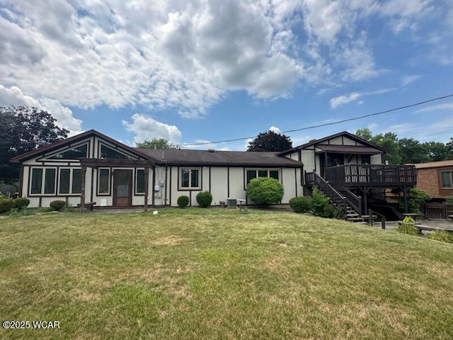 1317 Timberlane Dr, Lima, OH 45805 - view of front of property with stairway, a wooden deck, and a front yard