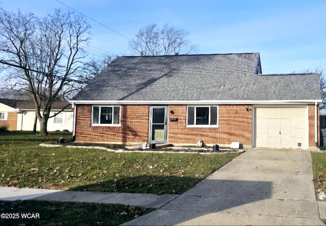 view of front of property with concrete driveway, roof with shingles, an attached garage, a front lawn, and brick siding