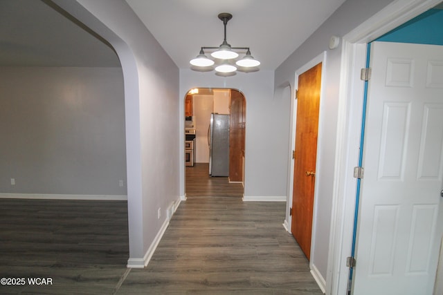 hall with dark wood-type flooring