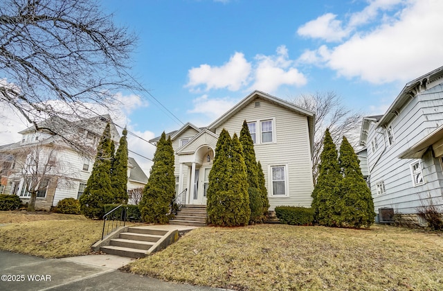 view of front of house with a front lawn and entry steps