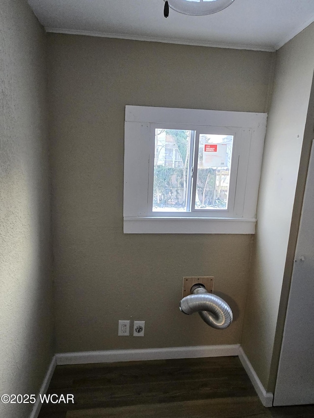 laundry room with dark hardwood / wood-style floors and hookup for an electric dryer