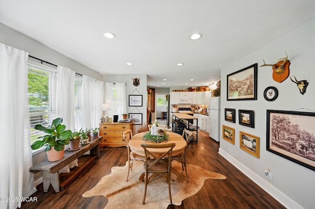 219 N Market St, Kenton, OH 43326 - dining area featuring recessed lighting, baseboards, and dark wood finished floors