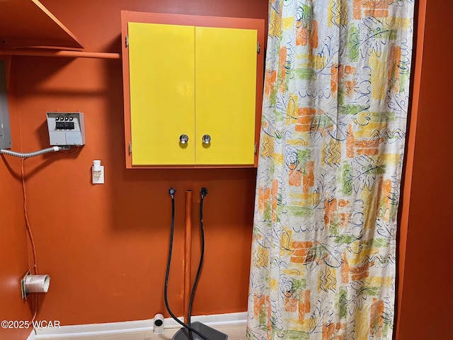 1440 Southwood Dr, Lima, OH 45805 - bathroom with baseboards and a shower with shower curtain