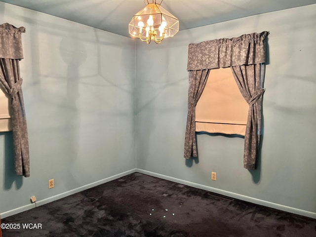 1440 Southwood Dr, Lima, OH 45805 - carpeted empty room with a chandelier and baseboards