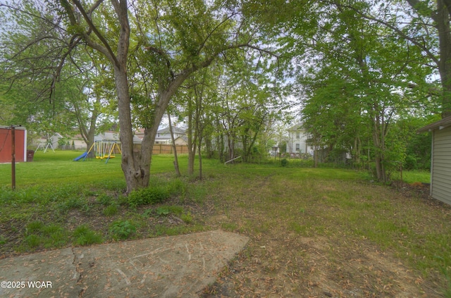 430 Hazel Ave, Lima, OH 45801 - view of green lawn featuring a playground