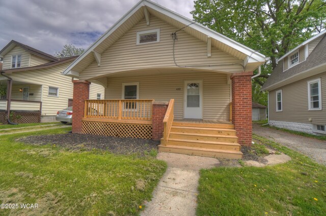 430 Hazel Ave, Lima, OH 45801 - bungalow-style home with a porch