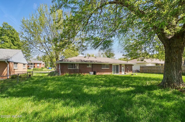 2911 Lakewood Ave, Lima, OH 45805 - rear view of property with brick siding