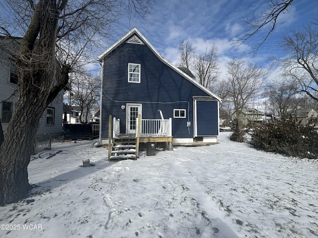 view of snow covered property