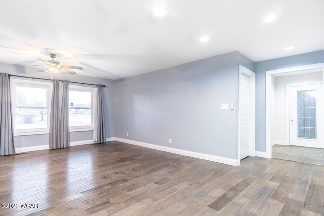 1758 W Hume Rd, Lima, OH 45806 - spare room with ceiling fan and dark hardwood / wood-style flooring