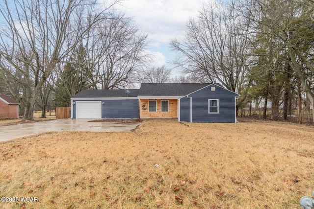 1758 W Hume Rd, Lima, OH 45806 - single story home with a garage and a front lawn