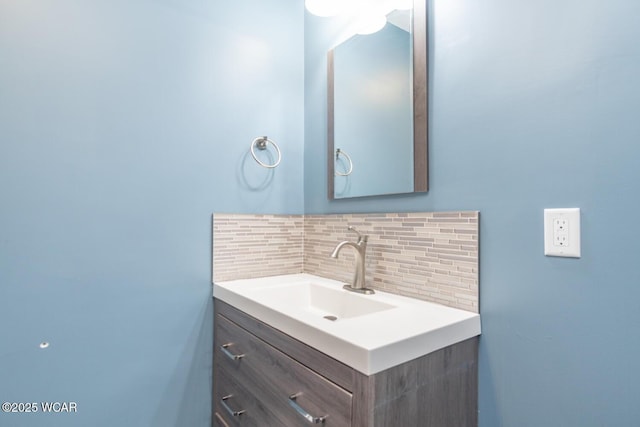 1758 W Hume Rd, Lima, OH 45806 - bathroom with vanity and tasteful backsplash