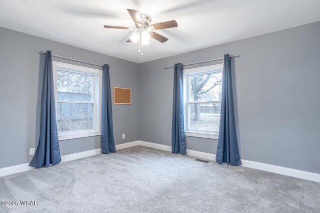 1758 W Hume Rd, Lima, OH 45806 - spare room with light carpet and ceiling fan