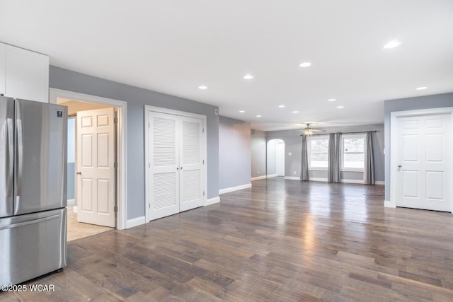 1758 W Hume Rd, Lima, OH 45806 - unfurnished living room with ceiling fan and dark hardwood / wood-style flooring