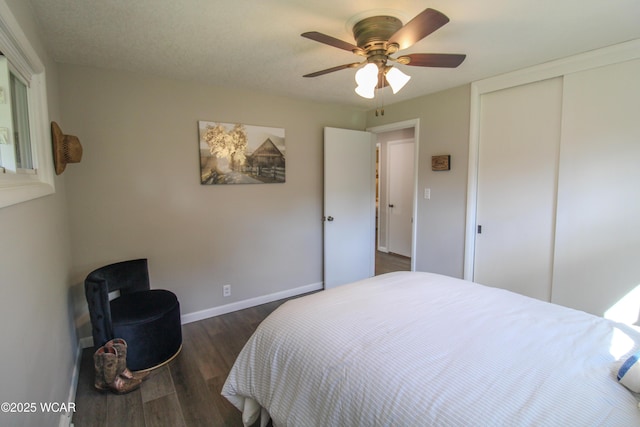 4945 New Haven Dr, Lima, OH 45806 - bedroom featuring dark wood finished floors, a closet, and a ceiling fan