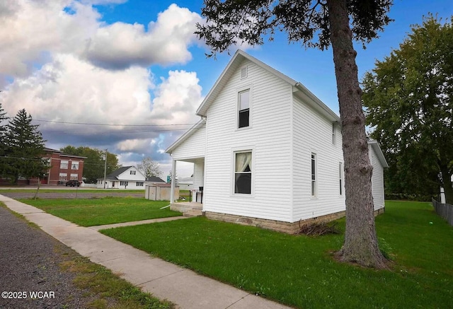view of property exterior featuring a yard