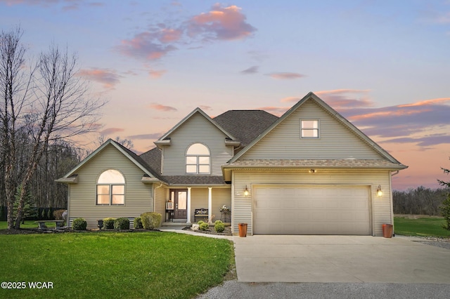 2691 Cremean Rd, Elida, OH 45807 - traditional-style house with a front yard, a shingled roof, a garage, and concrete driveway