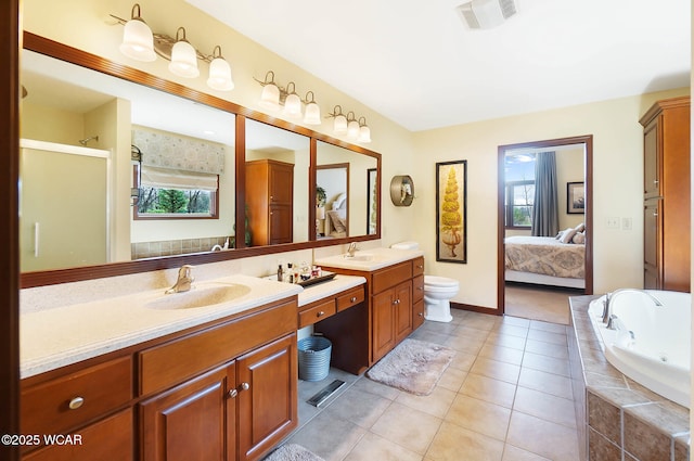 2691 Cremean Rd, Elida, OH 45807 - full bathroom with a tub with jets, visible vents, a sink, tile patterned floors, and double vanity