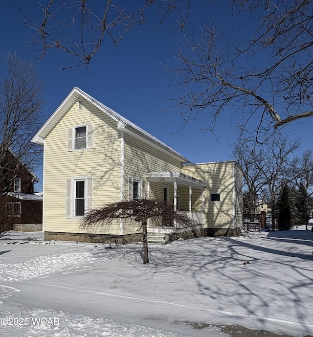 view of snow covered property