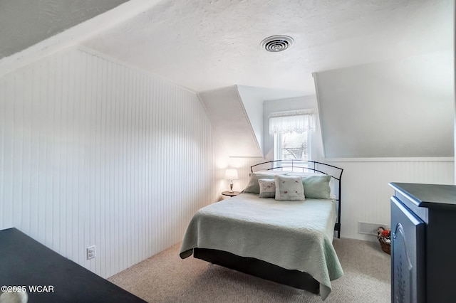 bedroom featuring visible vents and carpet flooring