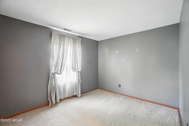 807 Centerfield Dr, Paulding, OH 45879 - empty room featuring carpet floors and a textured ceiling