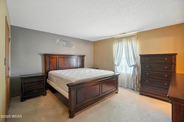 807 Centerfield Dr, Paulding, OH 45879 - bedroom featuring light colored carpet and a textured ceiling