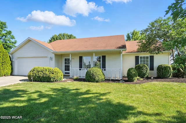 807 Centerfield Dr, Paulding, OH 45879 - single story home featuring a garage, covered porch, a front yard, driveway, and a shingled roof