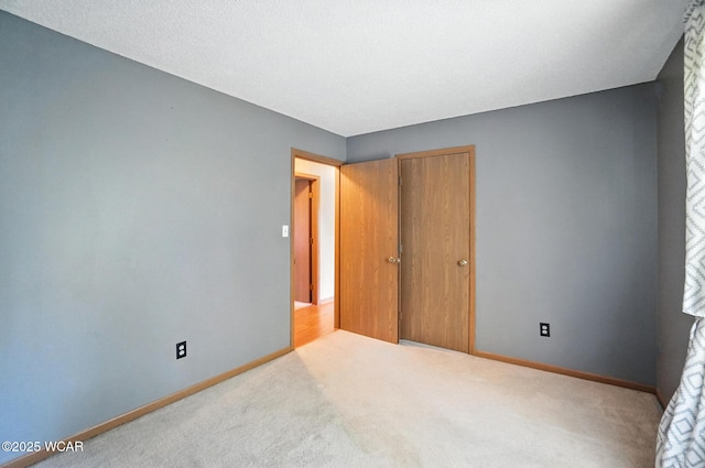 807 Centerfield Dr, Paulding, OH 45879 - unfurnished bedroom with carpet and a closet