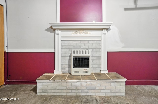 807 Centerfield Dr, Paulding, OH 45879 - detailed view of heating unit and a brick fireplace