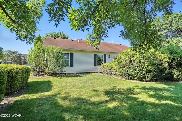 807 Centerfield Dr, Paulding, OH 45879 - back of house with a yard