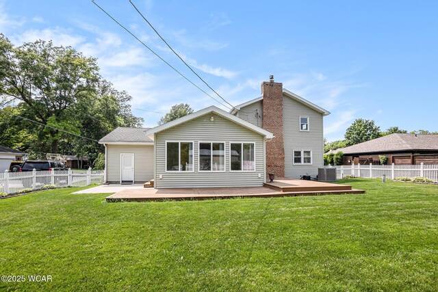 2069 High Ridge Rd, Lima, OH 45805 - rear view of house with a deck, a chimney, and a patio