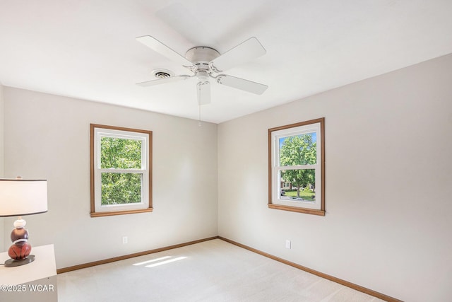 2069 High Ridge Rd, Lima, OH 45805 - spare room featuring light colored carpet and a ceiling fan