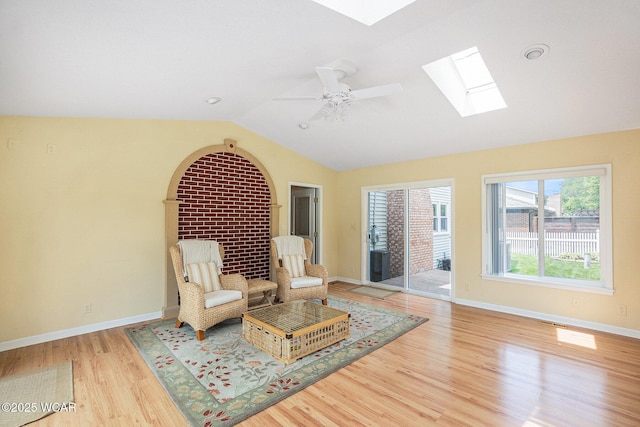 2069 High Ridge Rd, Lima, OH 45805 - unfurnished room with a skylight, lofted ceiling, wood finished floors, and a ceiling fan