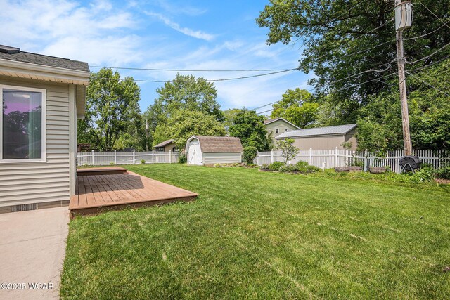 2069 High Ridge Rd, Lima, OH 45805 - fenced backyard featuring a wooden deck and a shed