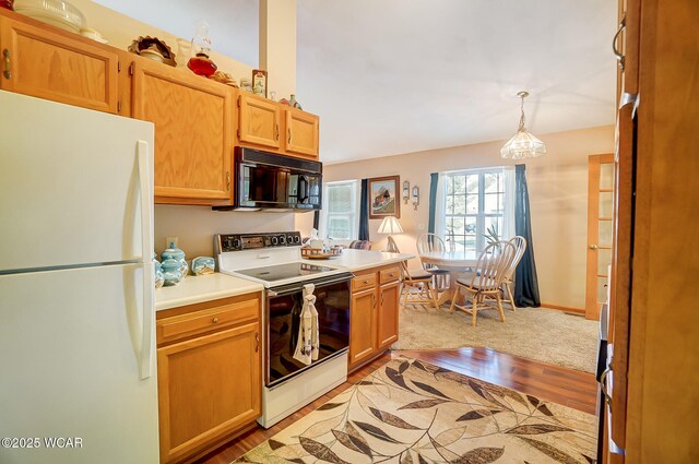 carpeted bedroom featuring ornamental molding and ceiling fan