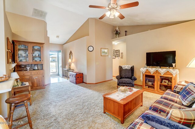 living room with sink, ceiling fan, track lighting, light carpet, and vaulted ceiling