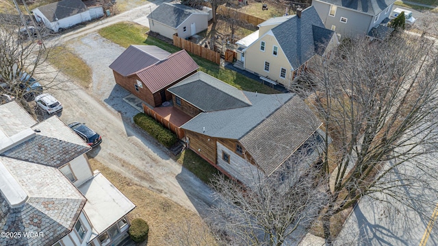 birds eye view of property with a residential view