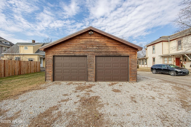 detached garage with fence